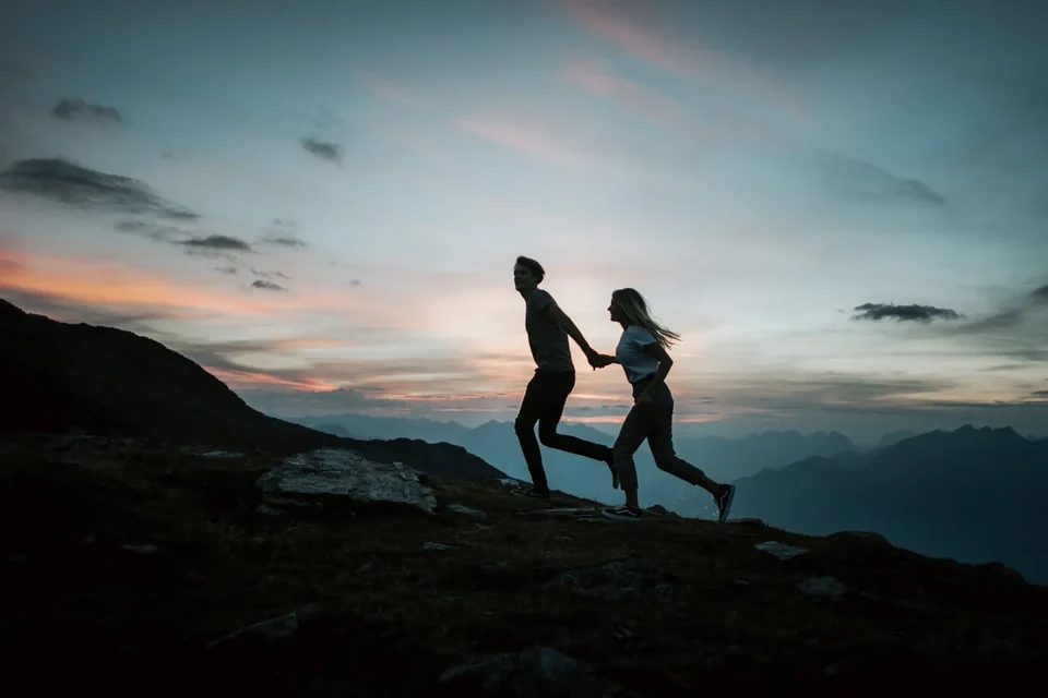 The couple playing in the last evening light after the yes